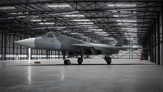 parked gray jet plane thumbnail
