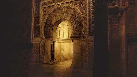close up photo of gray concrete decorative arch gate thumbnail
