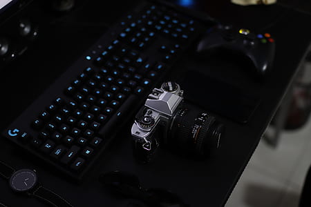 closeup photo of keyboard near camera thumbnail