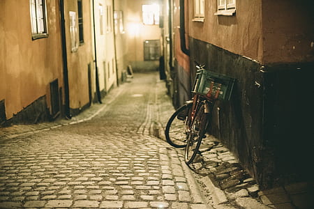 bike parked on alley way thumbnail
