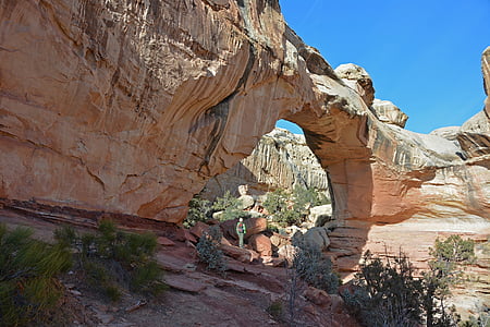 photo of brown rock formation under blue sky during daytime thumbnail
