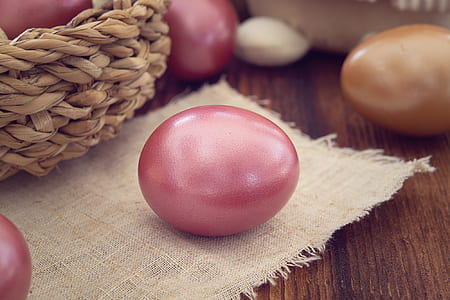 red egg on white textile thumbnail