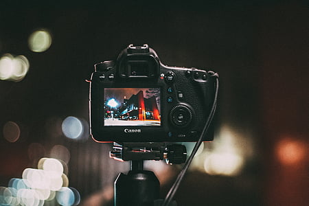 black and gray Canon DSLR camera thumbnail
