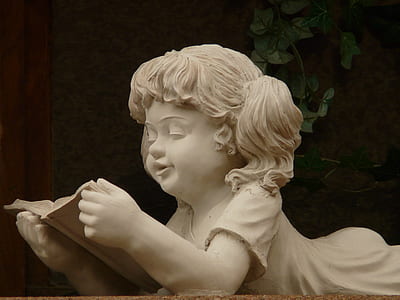 girl reading book white statue thumbnail