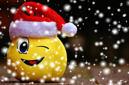 yellow emoji plush toy wearing red Santa Claus hat thumbnail