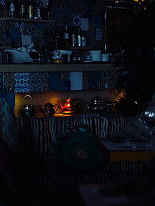 assorted decorative teapot in dimmed room thumbnail