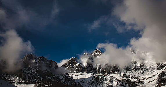 white and brown mountains during daytime thumbnail