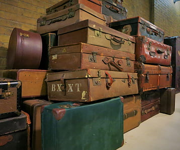 assorted-color suitcases thumbnail
