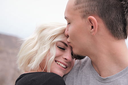 man in gray top and woman black top thumbnail