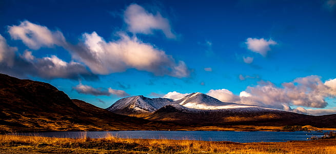 Person Showing Mountain Landscape thumbnail