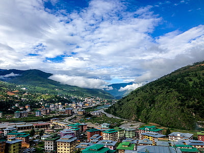 aerial view of city near mountain during daytime thumbnail