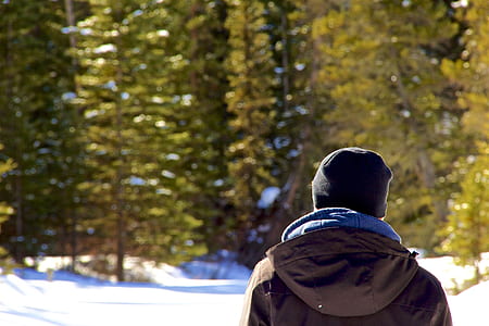 shallow focus photography of man looking at trees outdoor thumbnail