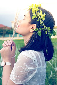 woman sniffing hay thumbnail