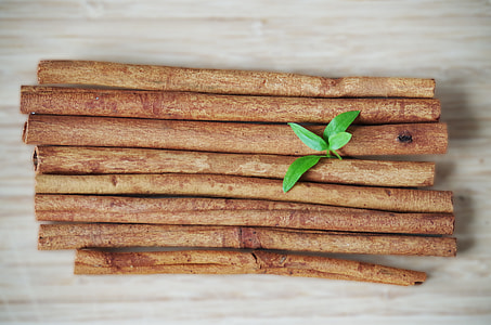 several wooden sticks placed on beige surface thumbnail