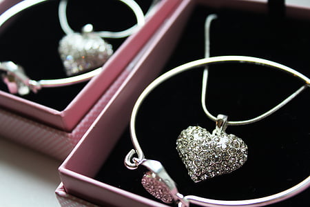 silver-colored bangle and necklace with box thumbnail