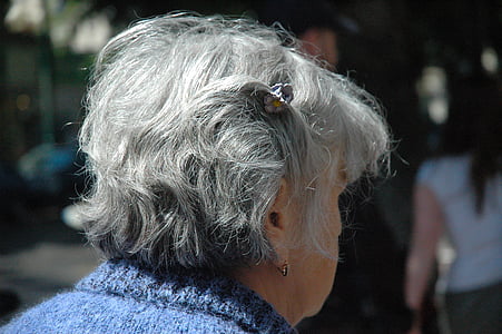 woman wearing blue top photography during daytime thumbnail