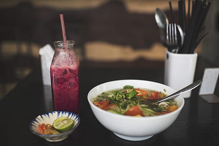 bowl with soup on table thumbnail