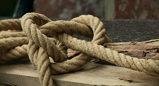 brown rope on brown wooden slab thumbnail