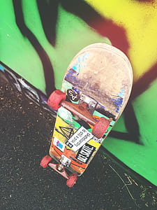 skateboard leaning on the wall thumbnail