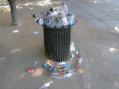 flowing empty bottles on trash bin thumbnail