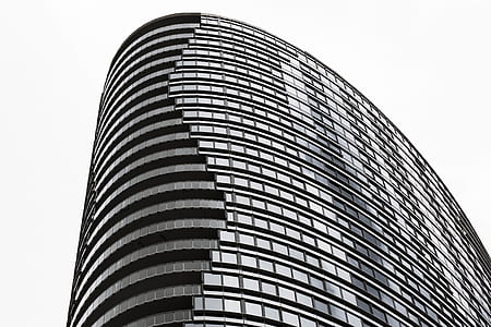 grayscale architectural photography of high-rise building thumbnail