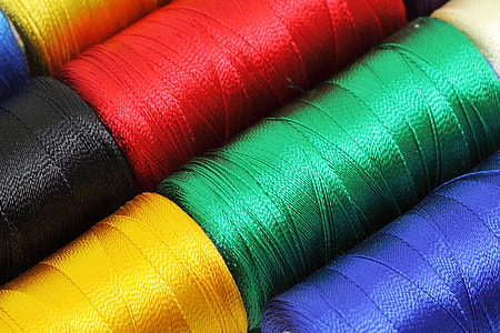 close-up photography of assorted-color threads thumbnail