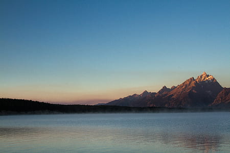 photo of mountain and body of water thumbnail