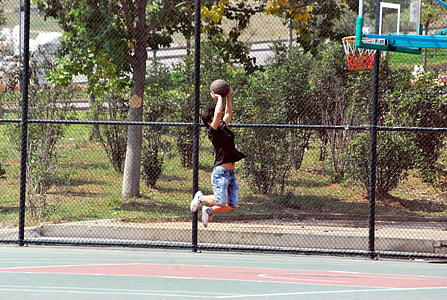 man about to shoot the ball on basketball hoop thumbnail
