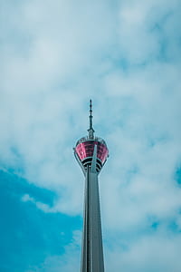 low-angle photography of CN tower under cloudy sky thumbnail