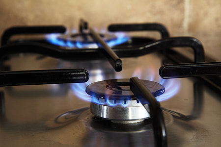 closeup photo of turned on gas stove burners thumbnail