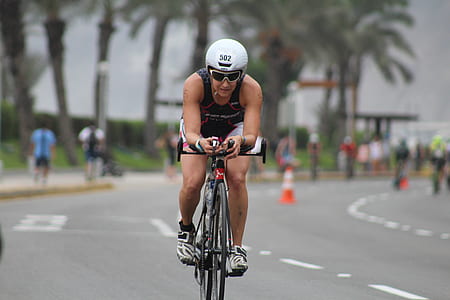 man riding on bicycle thumbnail