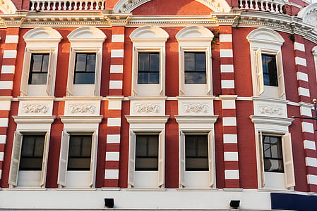 white and brown concrete building paint thumbnail