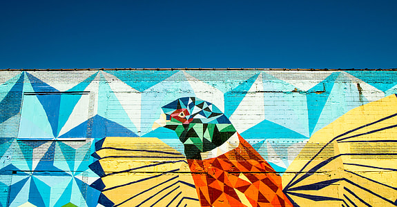 yellow, orange, and teal bird abstract painting thumbnail