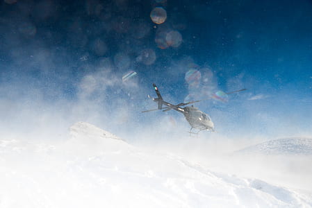 photo of gray helicopter during winter thumbnail