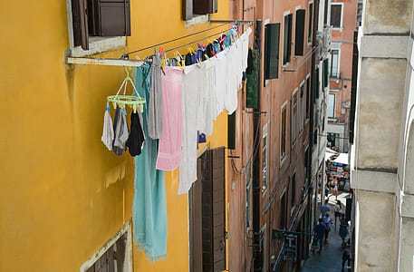 Pink Bath Towel Hang Outside Window thumbnail