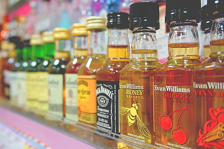 assorted liquor bottle lot thumbnail