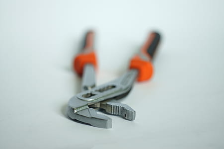 closeup photo of orange and black hand tool thumbnail