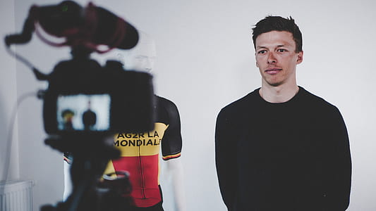 man wearing black crew-neck top thumbnail