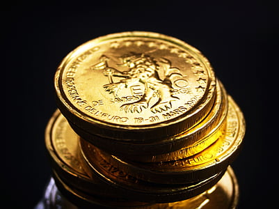 close up photo of gold-colored coin thumbnail