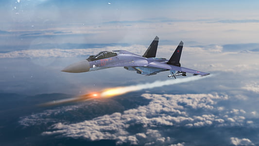 gray jet fighter launching a rocket missile during daytime thumbnail