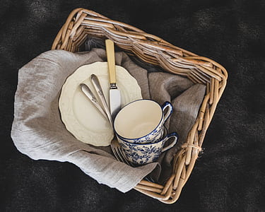 cup, plate, and fork inside of basket thumbnail