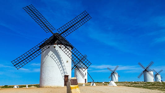 white windmill during day time thumbnail