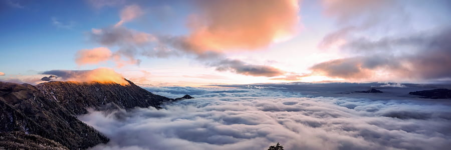 aerial photography of mountain and clouds at daytime thumbnail
