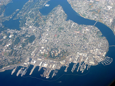 Aerial view of the city with Puget Sound Naval Shipyard in Washington thumbnail