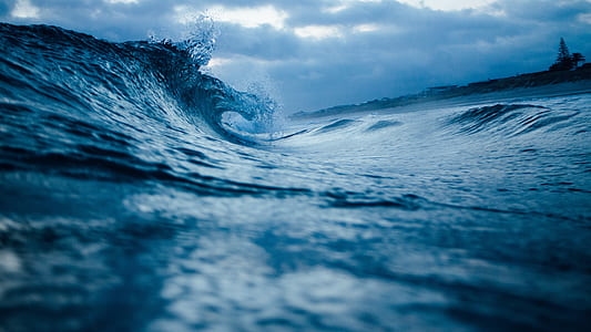 macrophotograph of ocean waves thumbnail