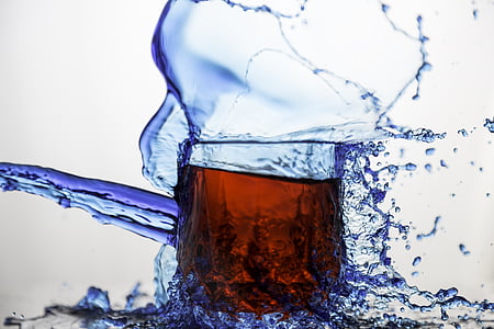 closeup photo of drinking glass with water splash thumbnail