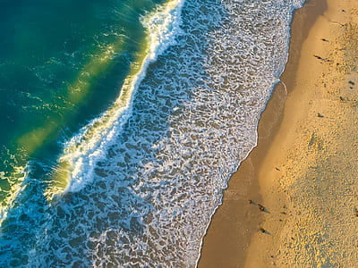top view of body of water during daytime thumbnail