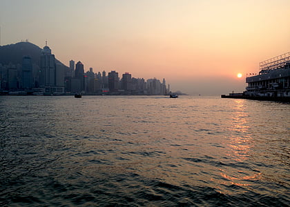city with high-rise buildings viewing calm sea thumbnail
