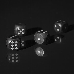 four black-and-white dices thumbnail
