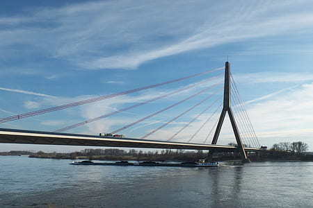 cable bridge under cloudy sky thumbnail